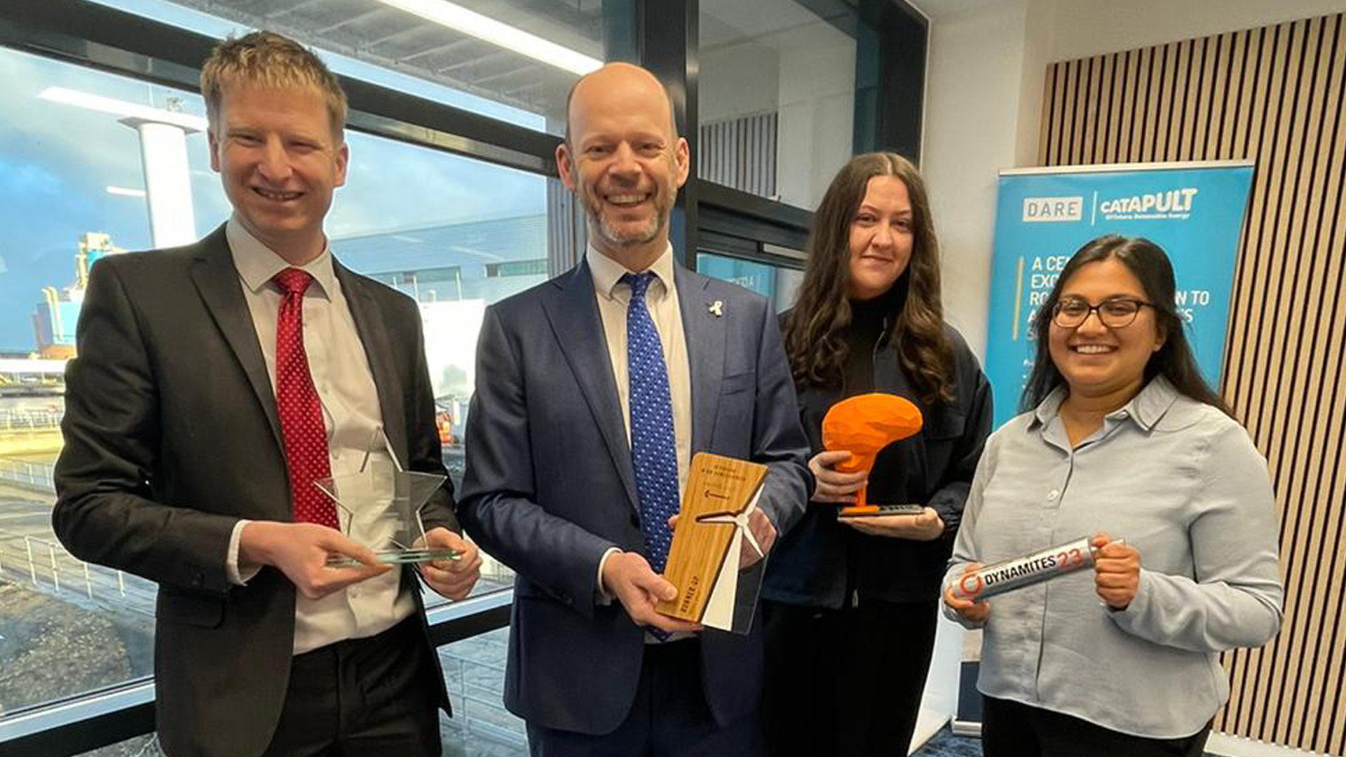 Dr Andrew Jenkins, founder of Kinewell Energy, Jamir Driscoll, elected metro mayor for the North of Tyne, Claire Hislop, research and development engineer and Henna Bains, senior engineer, showcase industry awards won by Kinewell over the past 12 months.